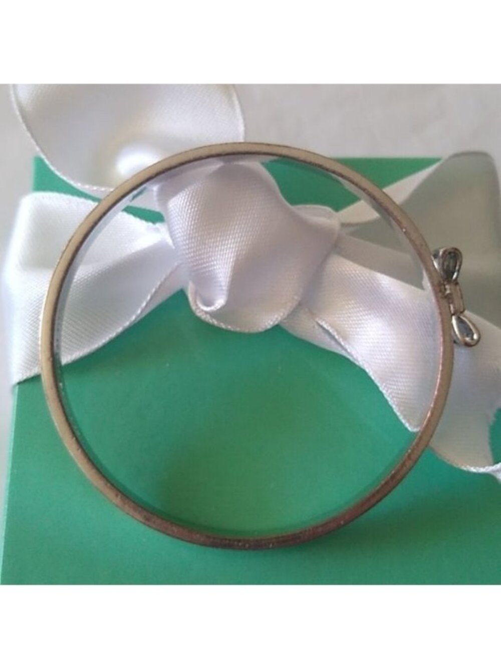 Kate Spade New York Take A Bow Bangle Bracelet, Silver, 2 3/8" opening - Picture 5 of 7